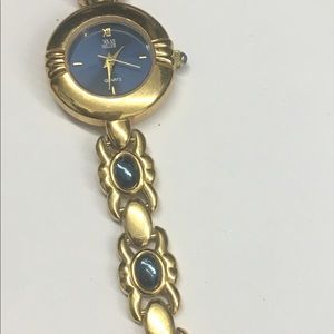 Nolan Miller jeweled bracelet watch